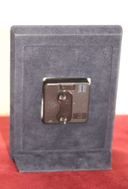 A stunning ornately detailed sterling silver framed "Florence" free-standing quartz alarm clock