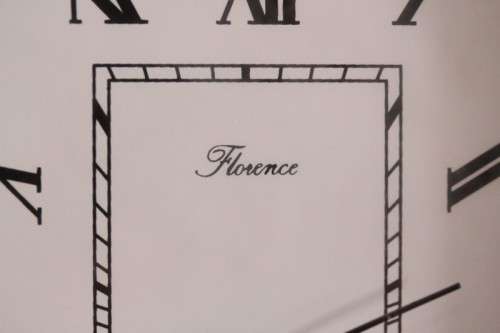 A stunning ornately detailed sterling silver framed "Florence" free-standing quartz alarm clock