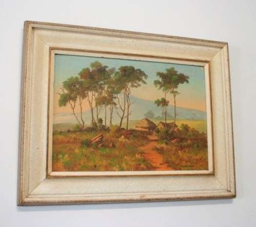 A beautiful framed original signed G Webber oil on board painting of a rural village.