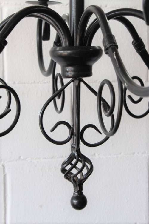 A stunning large 6-arm black wrought iron ceiling lights/ chandeliers  - Only one available