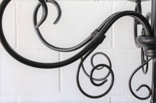 A stunning large 6-arm black wrought iron ceiling lights/ chandeliers  - Only one available