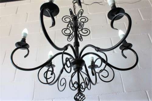 A stunning large 6-arm black wrought iron ceiling lights/ chandeliers  - Only one available