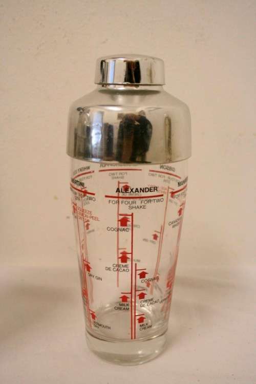 **RS17** A pair of vintage glass cocktail shakers w printed cocktail recipes & measurements markings