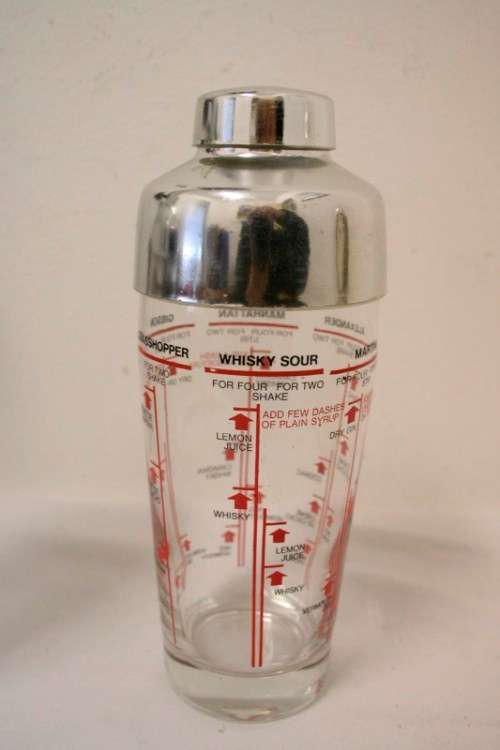 **RS17** A pair of vintage glass cocktail shakers w printed cocktail recipes & measurements markings