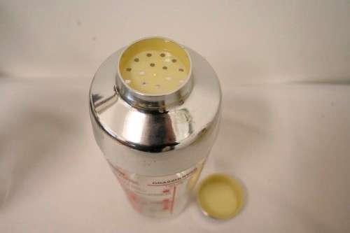 **RS17** A pair of vintage glass cocktail shakers w printed cocktail recipes & measurements markings