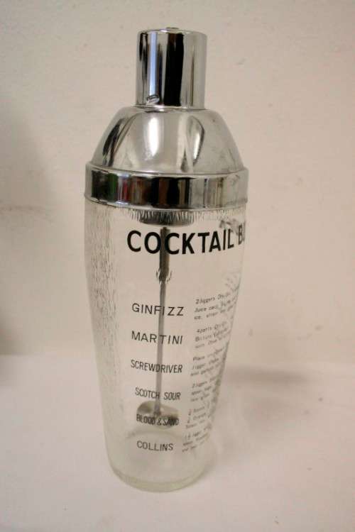 **RS17** A pair of vintage glass cocktail shakers w printed cocktail recipes & measurements markings