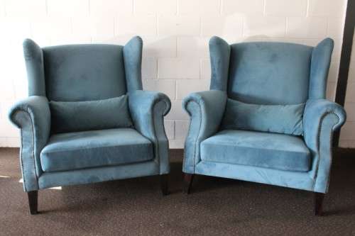 Two superb large top-end wing-back armchairs upholstered in a quality blue fabric - price per chair