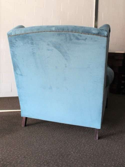 Two superb large top-end wing-back armchairs upholstered in a quality blue fabric - price per chair