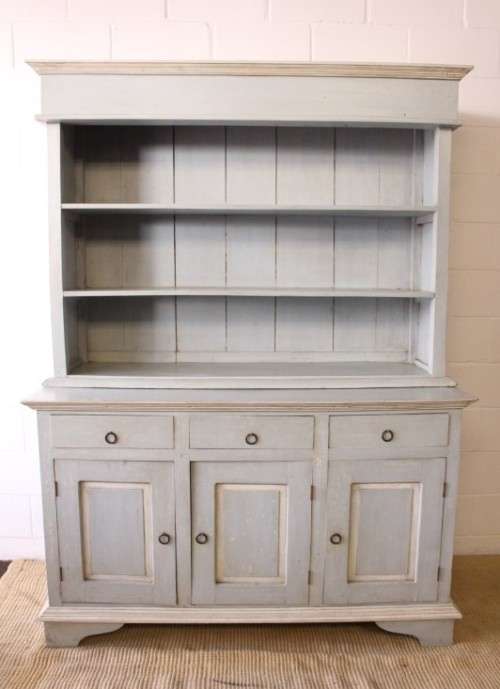 A gorgeous three drawer, three cupboard kitchen buffet side server in a pale blue painted technique
