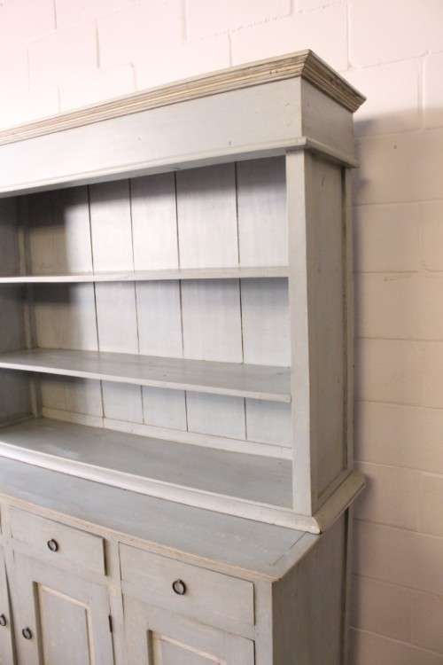 A gorgeous three drawer, three cupboard kitchen buffet side server in a pale blue painted technique