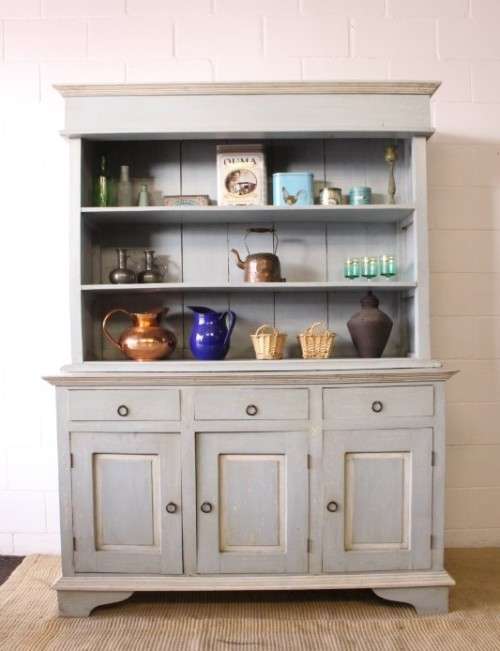 A gorgeous three drawer, three cupboard kitchen buffet side server in a pale blue painted technique