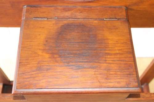 An incredible solid Oak hall stand with a bevelled mirror, "drawer" & six hooks for hats and coats!