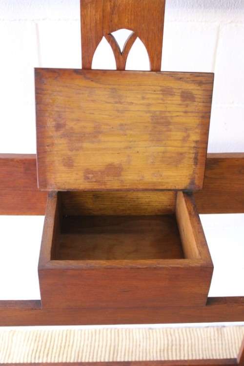 An incredible solid Oak hall stand with a bevelled mirror, "drawer" & six hooks for hats and coats!
