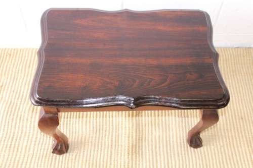A beautiful vintage scalloped edge solid African Stink wood ball and claw coffee/ side table