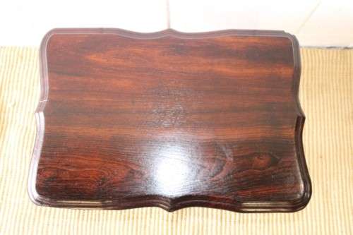 A beautiful vintage scalloped edge solid African Stink wood ball and claw coffee/ side table