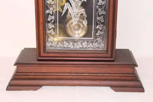 A beautiful and rare hand carved antique Ansonia "Gingerbread" shelf mantle clock with alarm bell