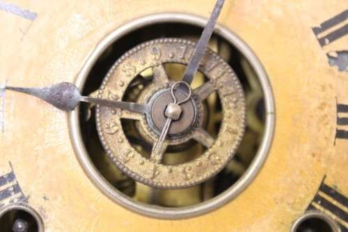 A beautiful and rare hand carved antique Ansonia "Gingerbread" shelf mantle clock with alarm bell