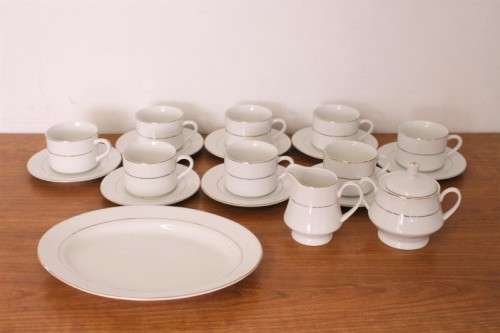 **RS17** Stunning white 8-setting porcelain tea service with a milk jug, sugar bowl and pastry plate