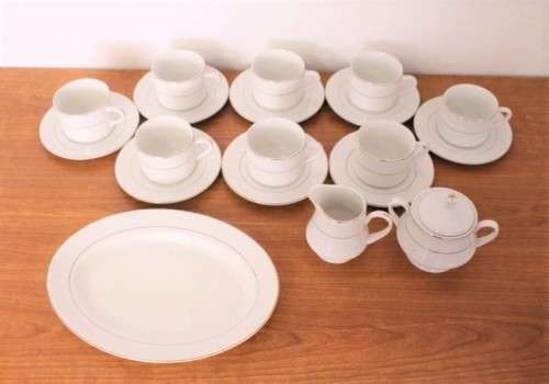 **RS17** Stunning white 8-setting porcelain tea service with a milk jug, sugar bowl and pastry plate