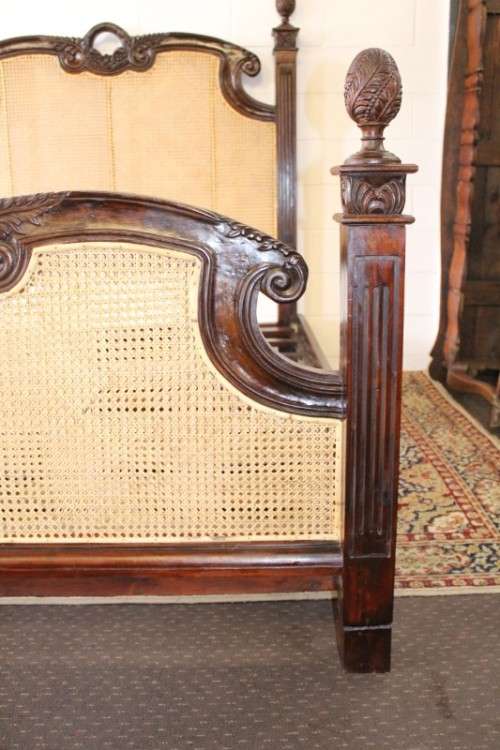 A magnificent antique "French Cane" King Louis XVI style hand carved solid Rosewood king-size bed