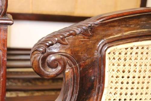 A magnificent antique "French Cane" King Louis XVI style hand carved solid Rosewood king-size bed