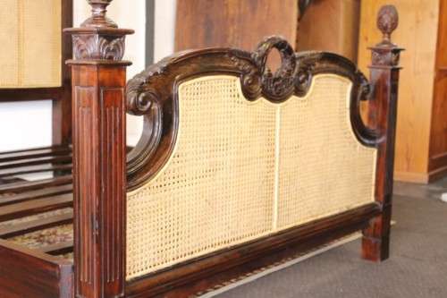 A magnificent antique "French Cane" King Louis XVI style hand carved solid Rosewood king-size bed
