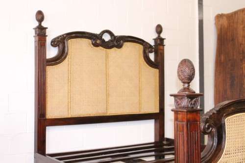 A magnificent antique "French Cane" King Louis XVI style hand carved solid Rosewood king-size bed