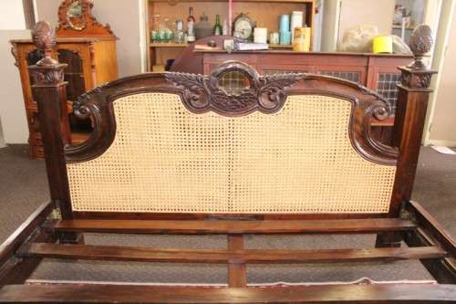 A magnificent antique "French Cane" King Louis XVI style hand carved solid Rosewood king-size bed