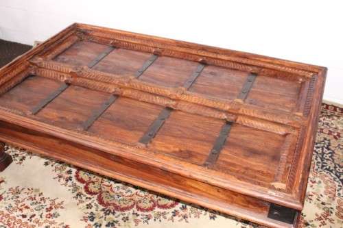 A fantastic solid Indonesian Teak carved centre coffee table w/ substantial legs and metal detailing