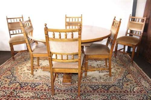 A gorgeous vintage Oak 6-seater extendable dining room table w/ 6x solid oak upholstered chairs