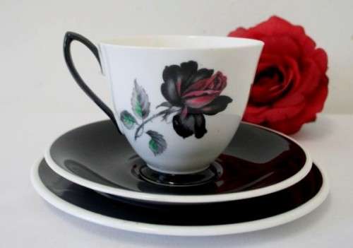 An exceptionally rare vintage "Royal Albert" fine bone china "Masquerade" pattern trio. price/trio