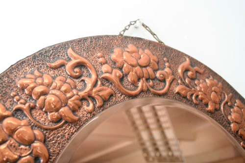 A superb antique ornately moulded copper framed round pink bevelled glass wall mirror - wow!!