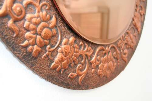 A superb antique ornately moulded copper framed round pink bevelled glass wall mirror - wow!!