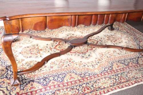 A vintage stink-wood scalloped edge ball and claw cross-brace 6-8-seater D/Table. Lifespace Sale