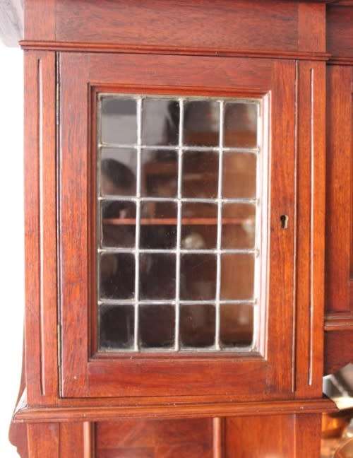 A spectacular antique Victorian honeyed-oak lead-glass door hutch buffet/ side server cabinet