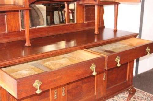 A spectacular antique Victorian honeyed-oak lead-glass door hutch buffet/ side server cabinet