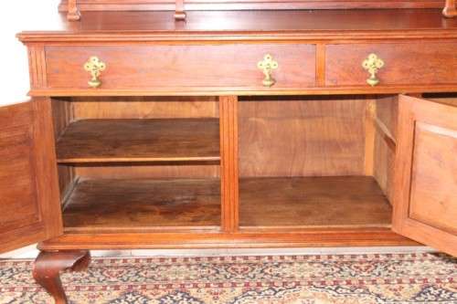A spectacular antique Victorian honeyed-oak lead-glass door hutch buffet/ side server cabinet
