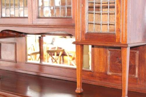 A spectacular antique Victorian honeyed-oak lead-glass door hutch buffet/ side server cabinet