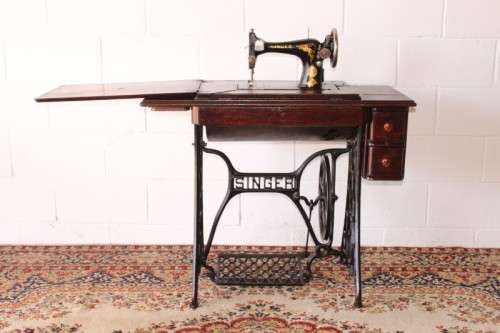Stunning antique 1937 Singer treadle sewing machine in its original fold-away cast-iron & oak stand