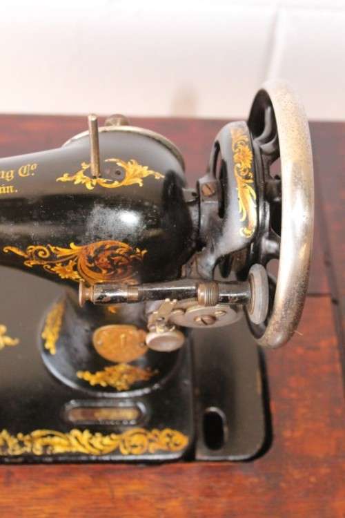 Stunning antique 1937 Singer treadle sewing machine in its original fold-away cast-iron & oak stand