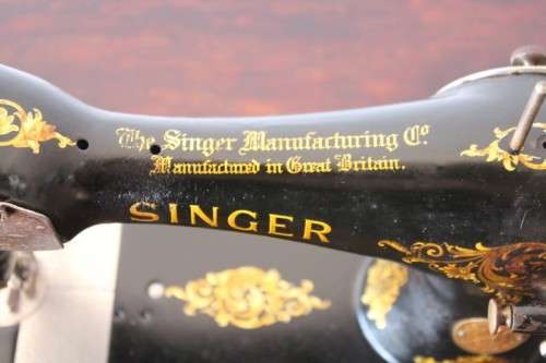 Stunning antique 1937 Singer treadle sewing machine in its original fold-away cast-iron & oak stand