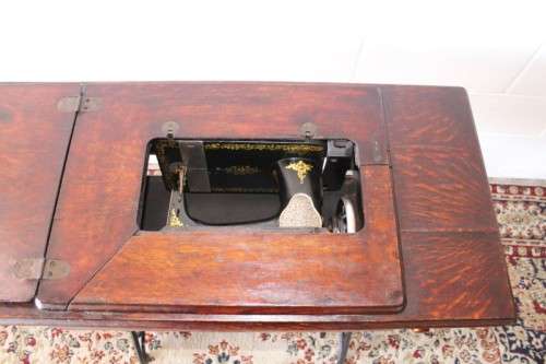 Stunning antique 1937 Singer treadle sewing machine in its original fold-away cast-iron & oak stand