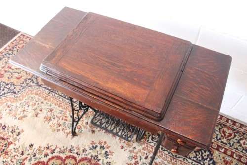 Stunning antique 1937 Singer treadle sewing machine in its original fold-away cast-iron & oak stand