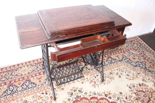 Stunning antique 1937 Singer treadle sewing machine in its original fold-away cast-iron & oak stand