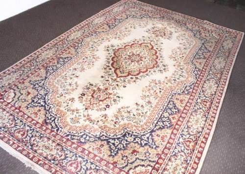 A stunning large 3m x 2m Turkish made Gumussuyu Topkapi Carpet in blue, green, creams & earthy tones