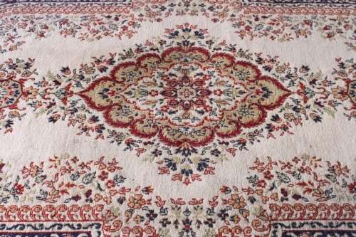 A stunning large 3m x 2m Turkish made Gumussuyu Topkapi Carpet in blue, green, creams & earthy tones