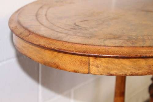 An incredible antique walnut & walnut burr carved loo table w/ marquetry inlay detailing on castors
