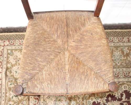 **RS17** A wonderful antique oak ladder-back dining/ occasional chair with a woven grass seat