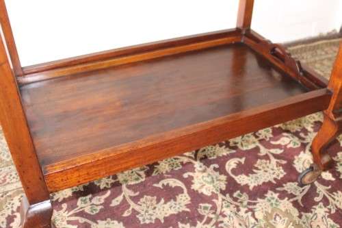 A wonderful solid Imbuia 2-tier tea/ drinks trolley with removable tray on its original castors