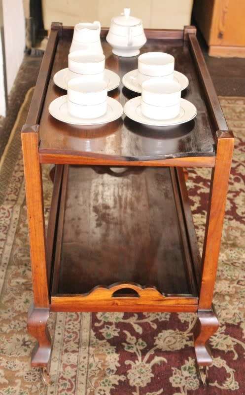 A wonderful solid Imbuia 2-tier tea/ drinks trolley with removable tray on its original castors